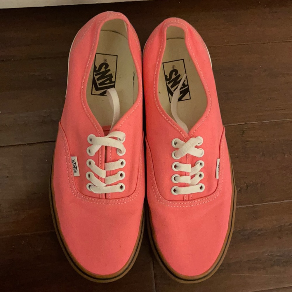 Pink vans with laces.